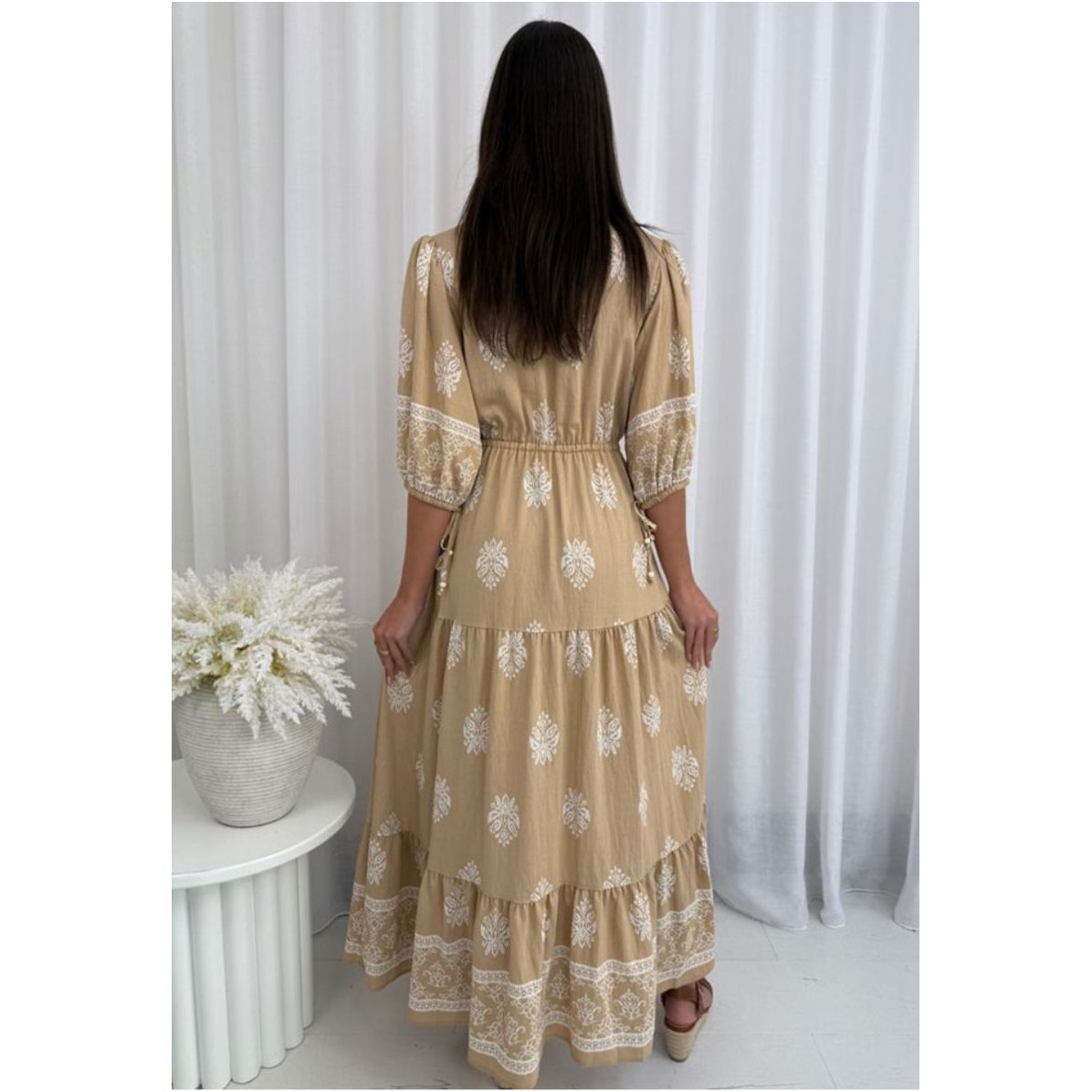 Plus-size model wearing size 14 St Barths dress with flattering fit