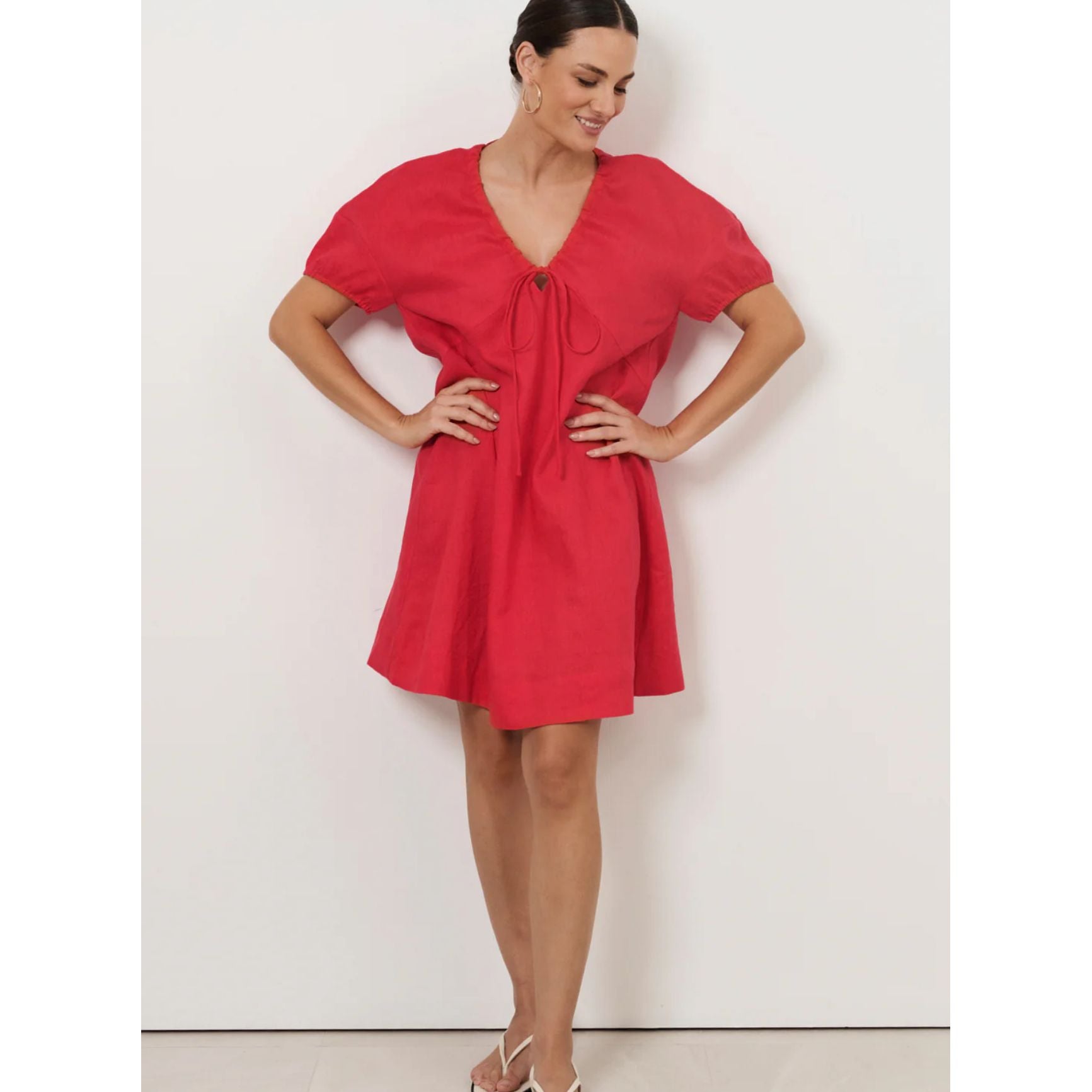 Model wearing merry red dress