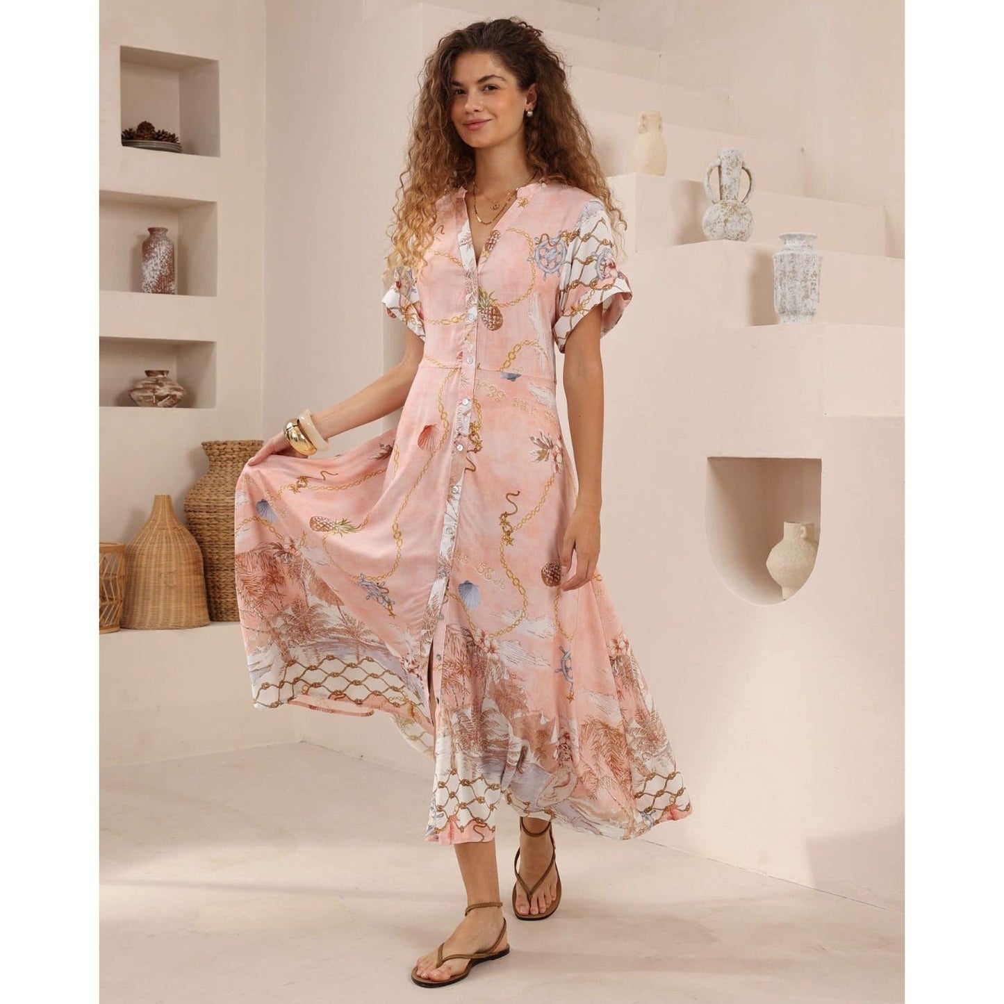 model wearing seashell shirt dress