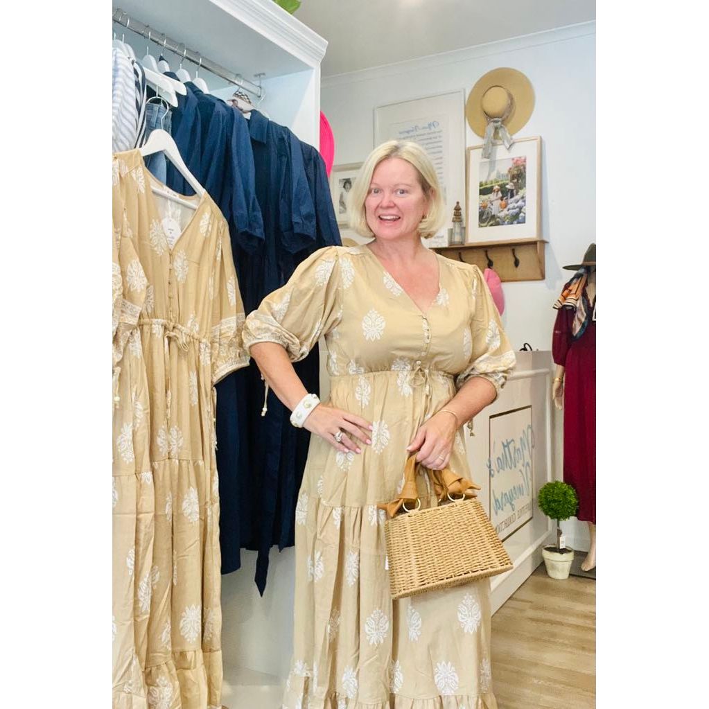 Close-up of long sleeve elastic cuff and elegant neckline of the St Barths dress